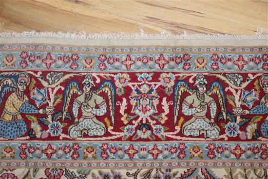 An Isfahan ivory ground pictoral rug (a.f.) 310 x 90cm